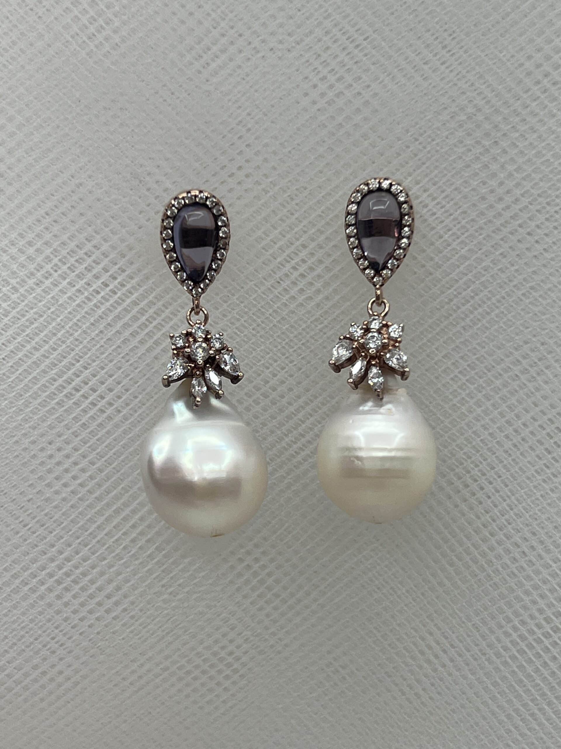 Pendientes de plata chapada en oro rosa con boton de amatista y perla natural