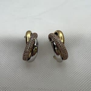 Pendientes de plata tricolor de aros entrelazados con circonitas