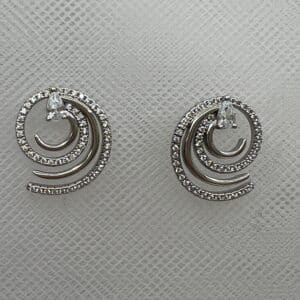 Pendientes de plata rodiados en oro blanco espirales de circonitas blancas y grises