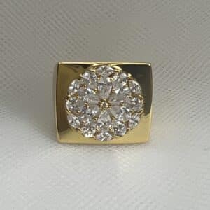 Anillo de plata chapado en oro amarillo sello con roseton de circonitas.
