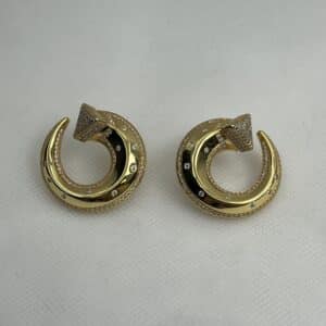 Pendientes de plata chapados en oro amarillo medias lunas con circonitas.