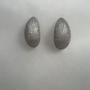 Pendientes de botones  alargados de pave con circonitas rodiados en oro blanco